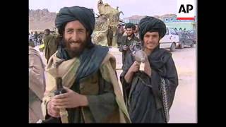 Afghan interim leader makes base in Mullah Omars compound [upl. by Ramona]