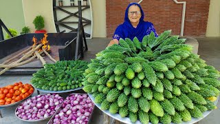 Karela Cooked In Our Traditional Style  Bitter Gourd Recipe  Village Cooking Recipe [upl. by Faxen]