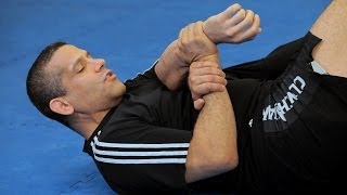 How to Do a Traditional Kimura from Guard  MMA Submissions [upl. by Pokorny]